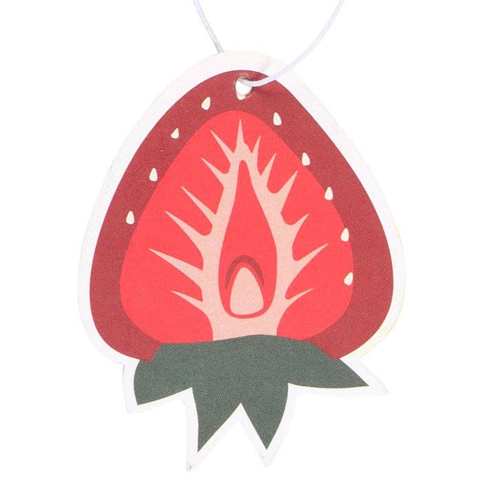 Strawberry-shaped air freshener with red center and green base on a white background