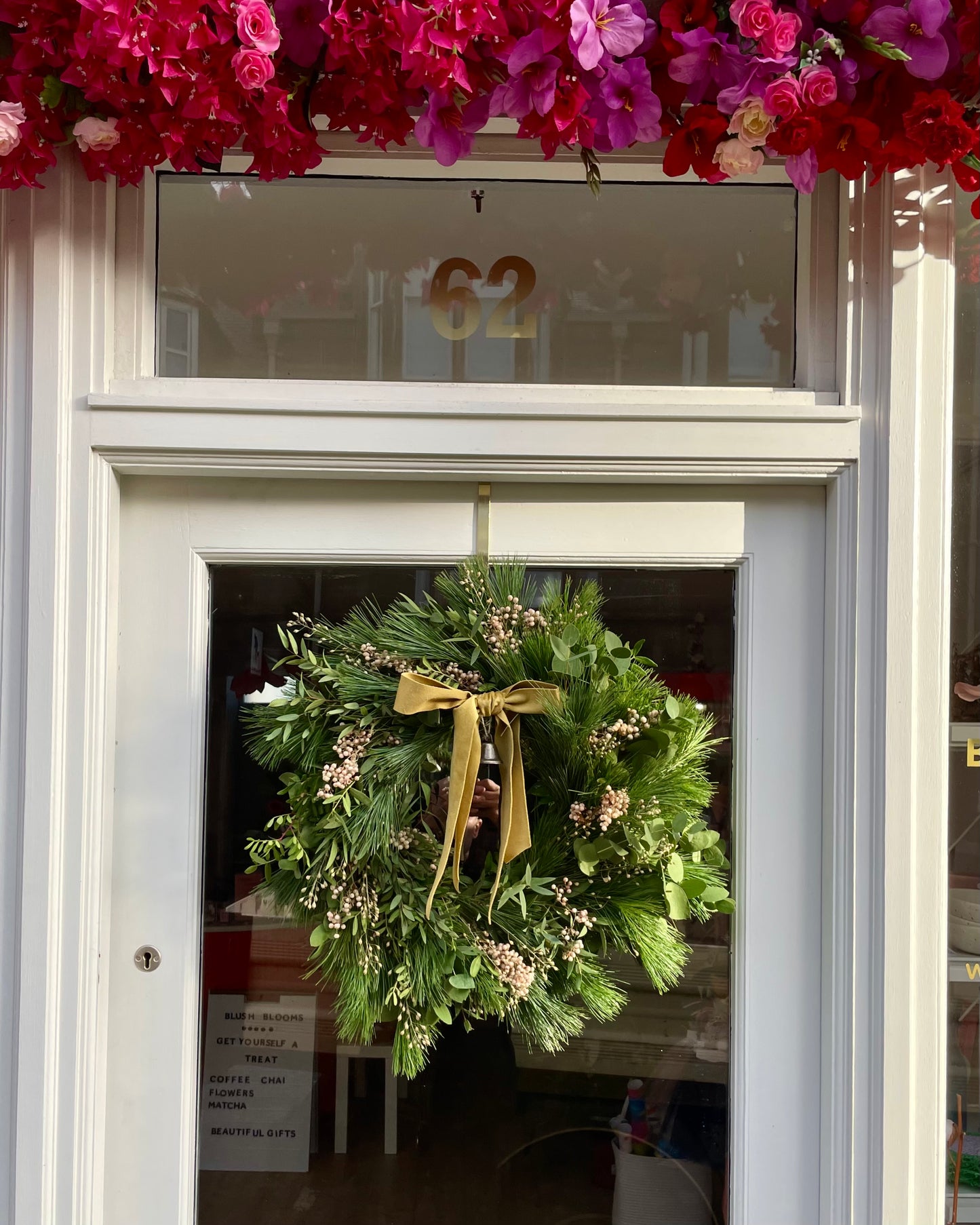 The Nordic Fresh Luxury Wreath on the door of Blush Blooms in Stonehaven