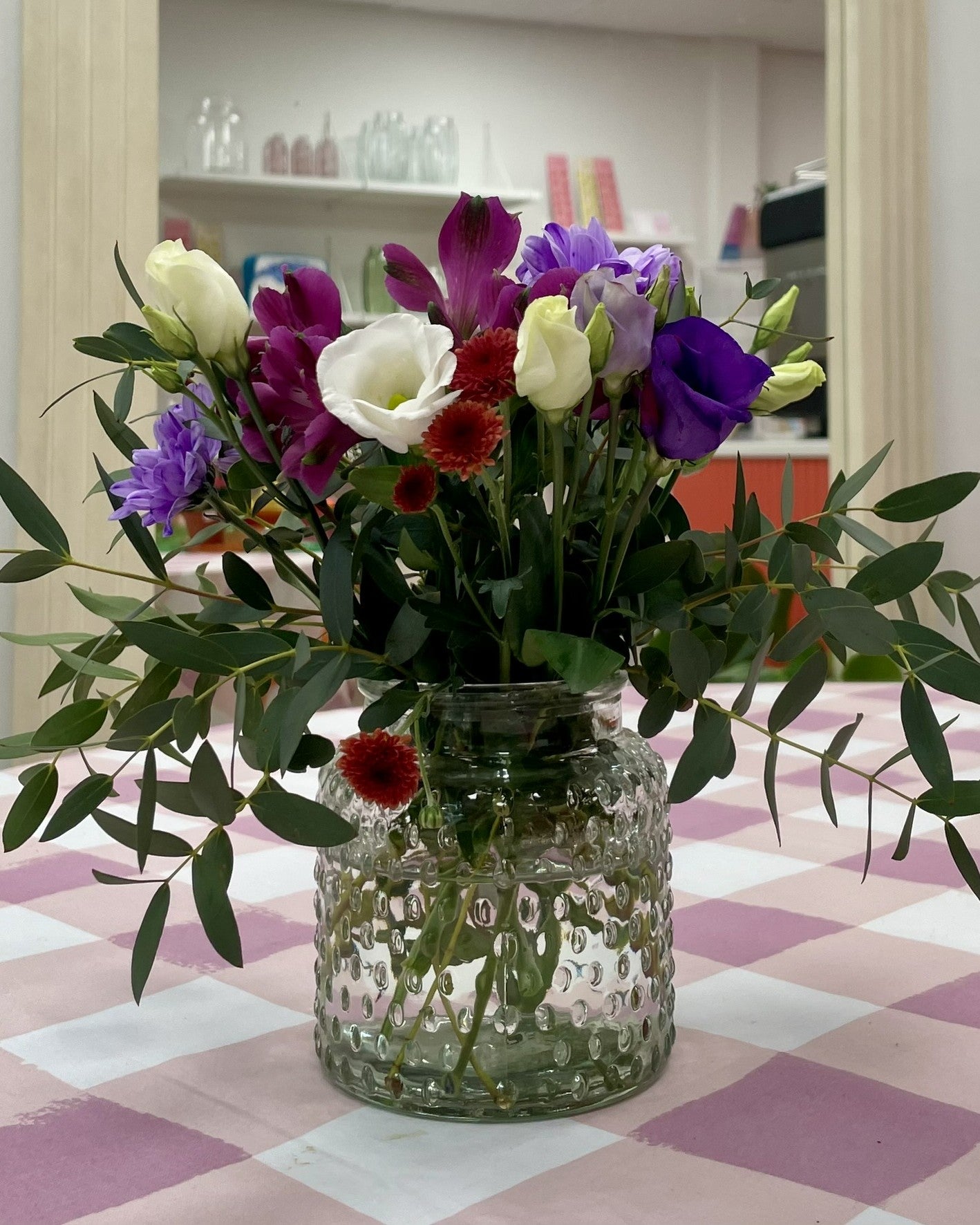 Mini flower bouquet in a small vase