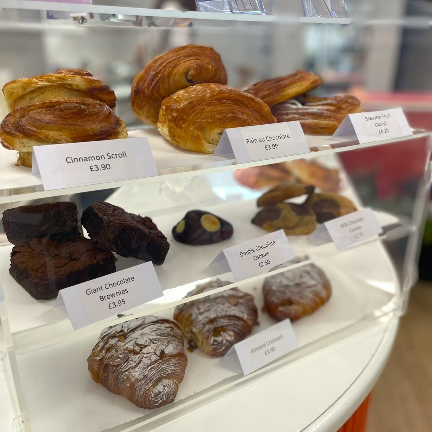 Cakes and pastries on displays in flower and coffee shop Aberdeenshire