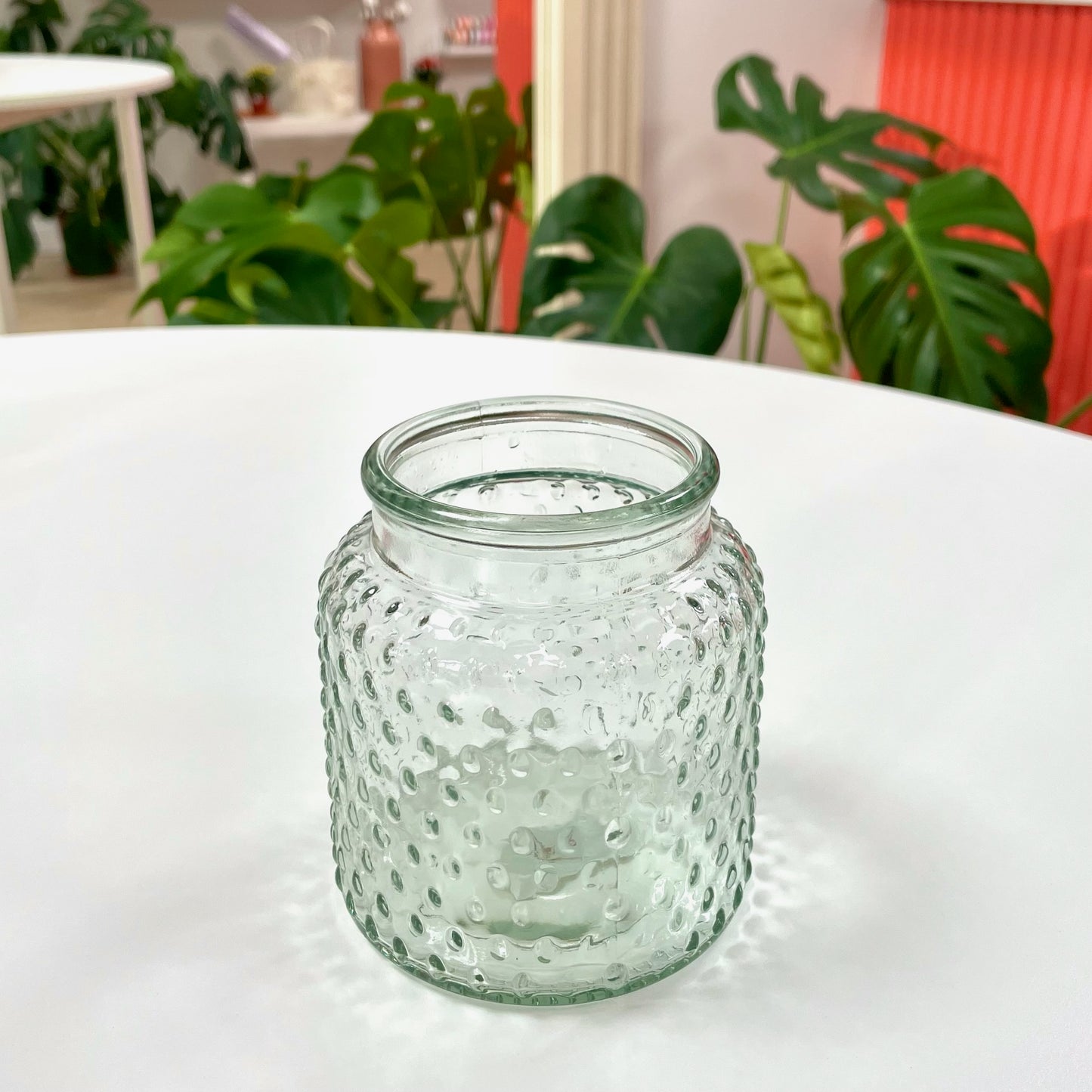Clear glass vase on white table