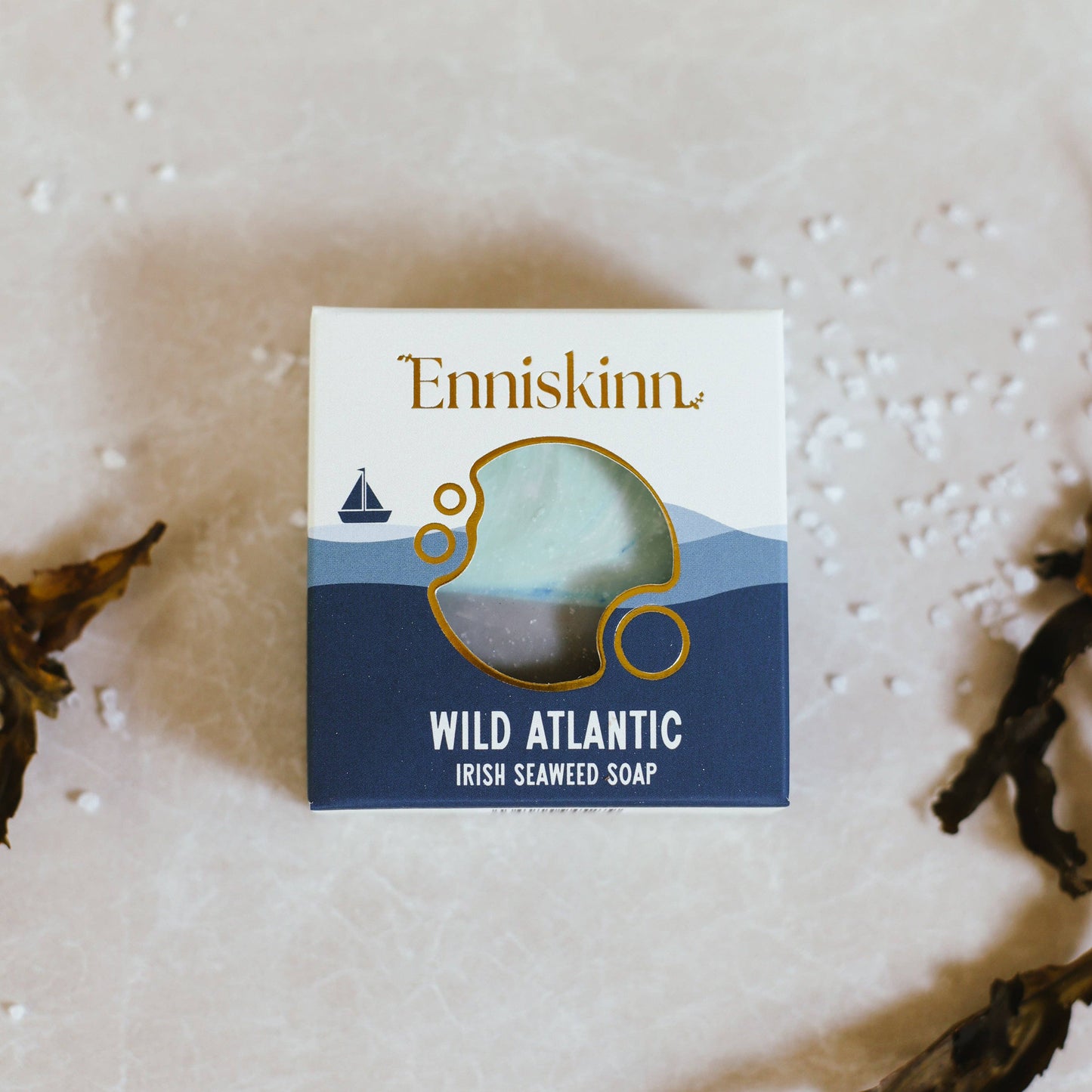 Enniskinn Wild Atlantic Irish Seaweed Soap packaging on a textured surface