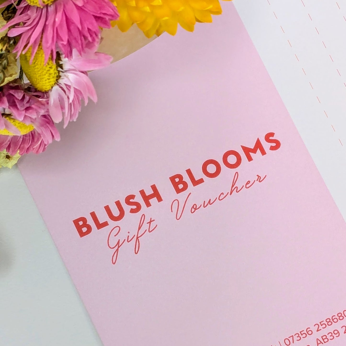 Pink Blush Blooms Gift Voucher with flowers on a white background