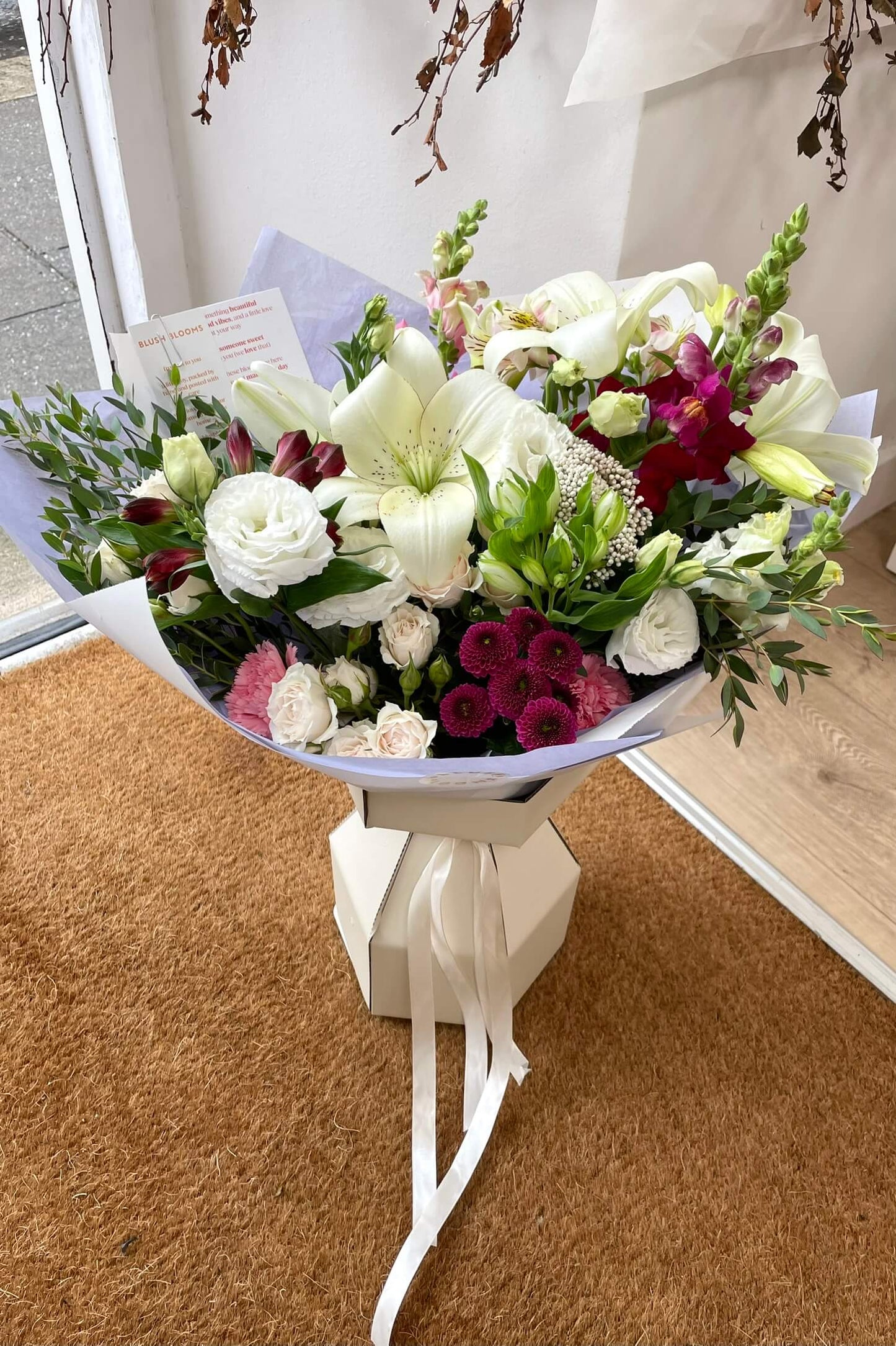 Example of a Florist’s Choice seasonal bouquet, style and colours may vary