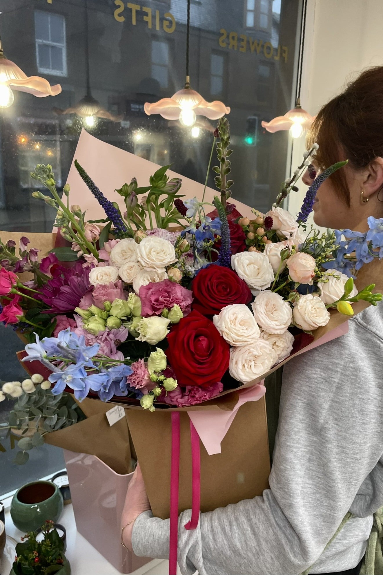 A Valentine’s Florist’s Choice bouquet featuring a seasonal mix of flowers, wrapped by Blush Blooms